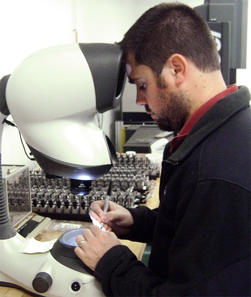 analyst using a machine for cmm inspection